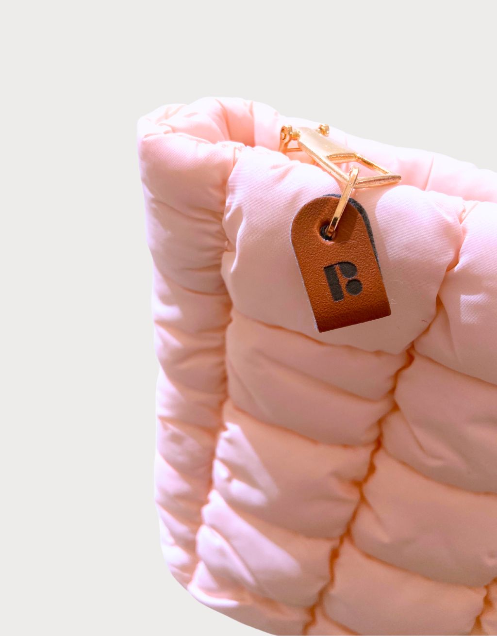 Bolso de cosméticos acolchado rosa claro